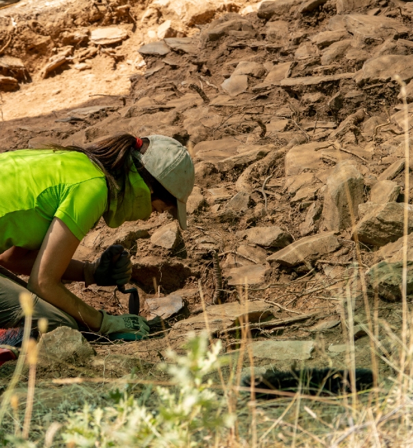 woman performing archeology