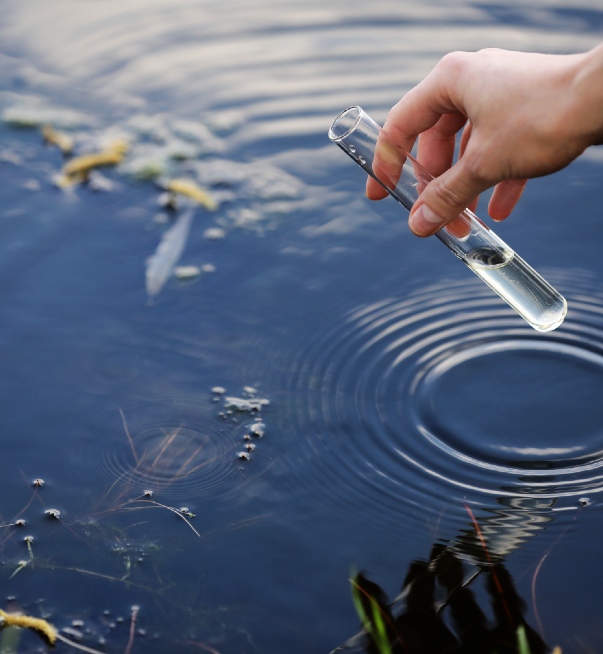 Man testing creek water